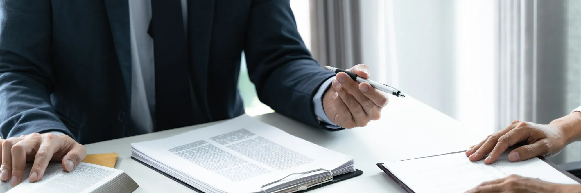Financial professionals reviewing documents
