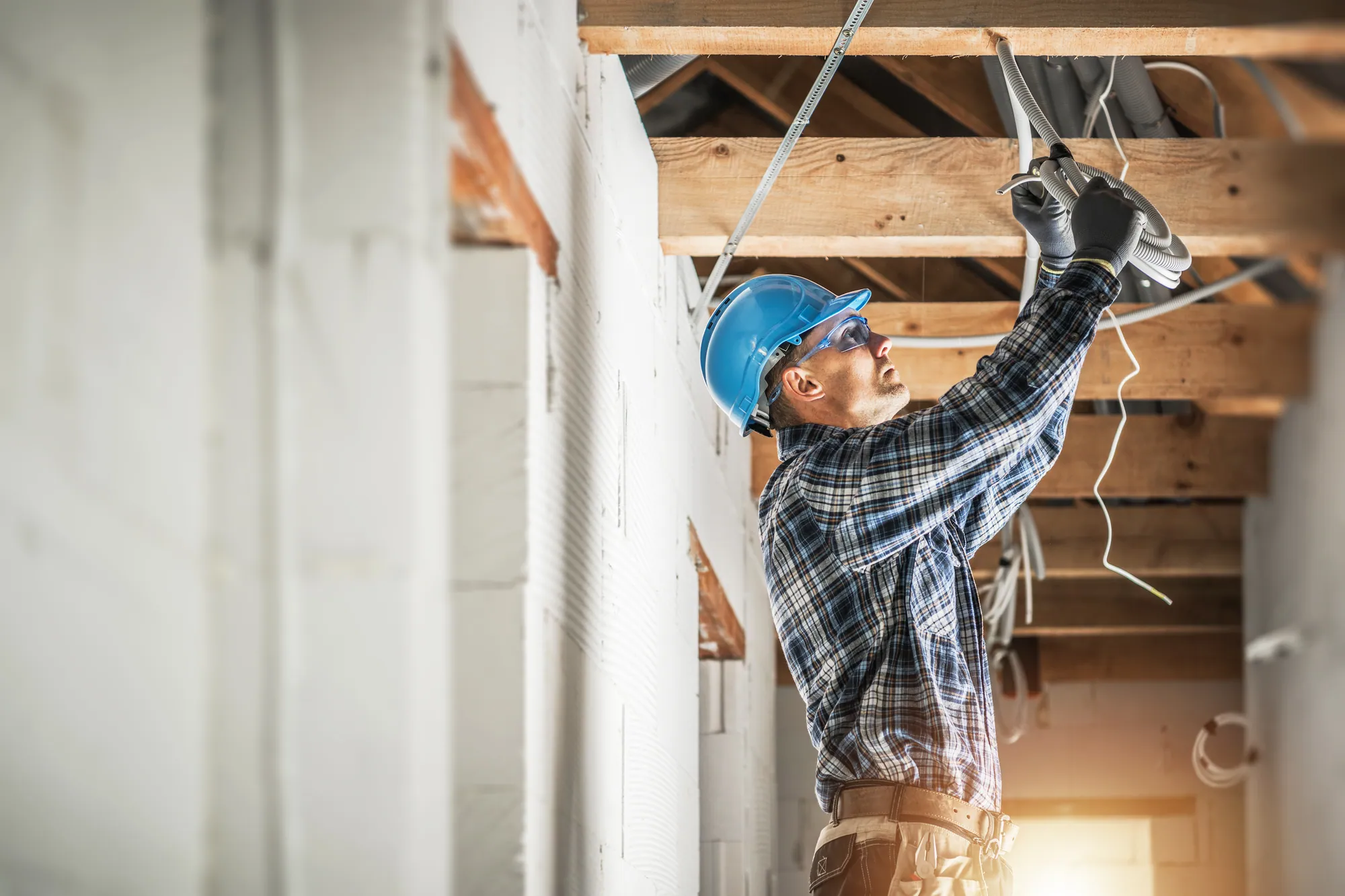 Electrician installing wiring