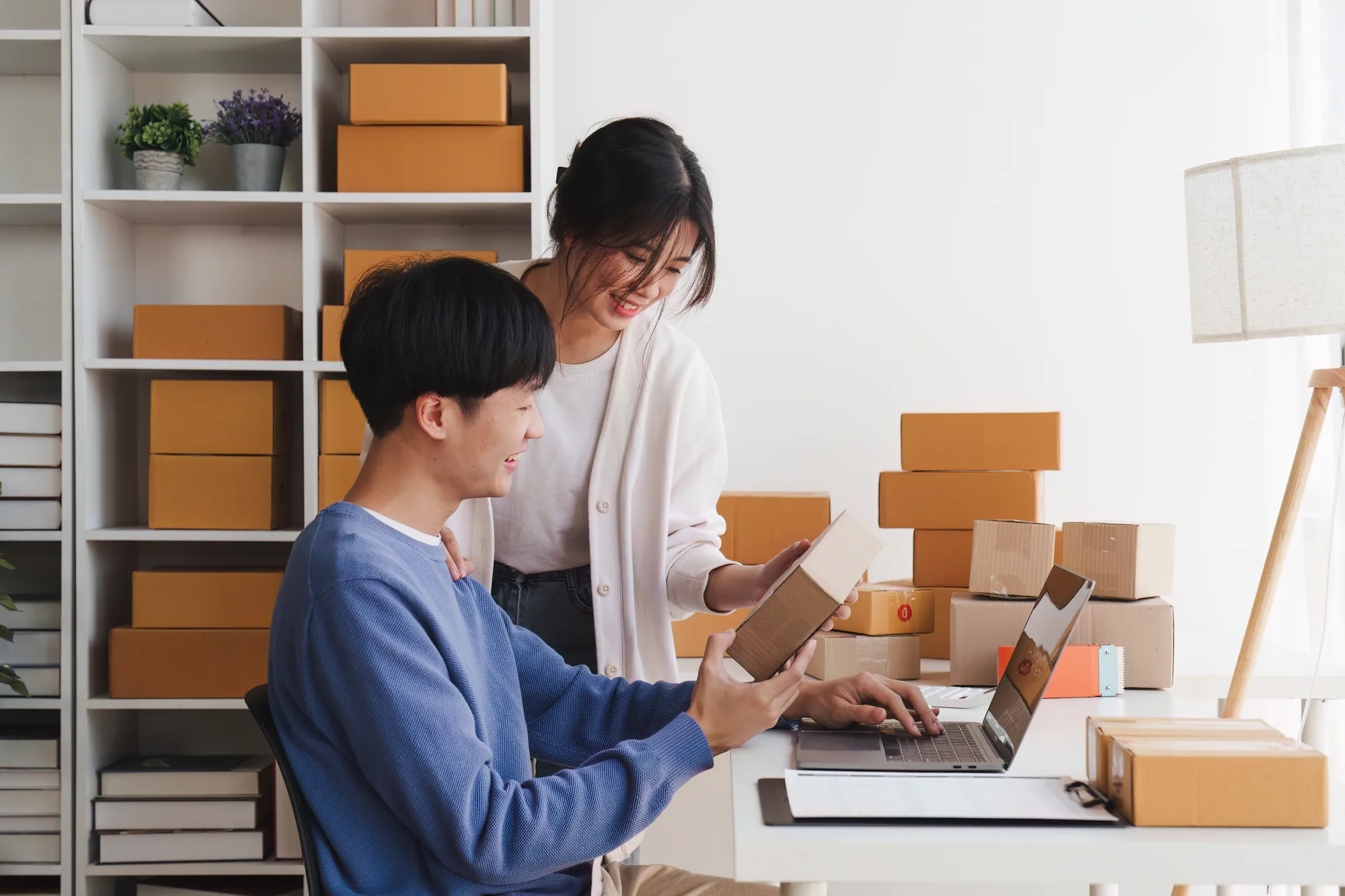 Small business owners working together on their website